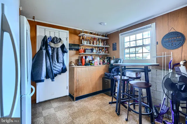 a room with furniture and a window