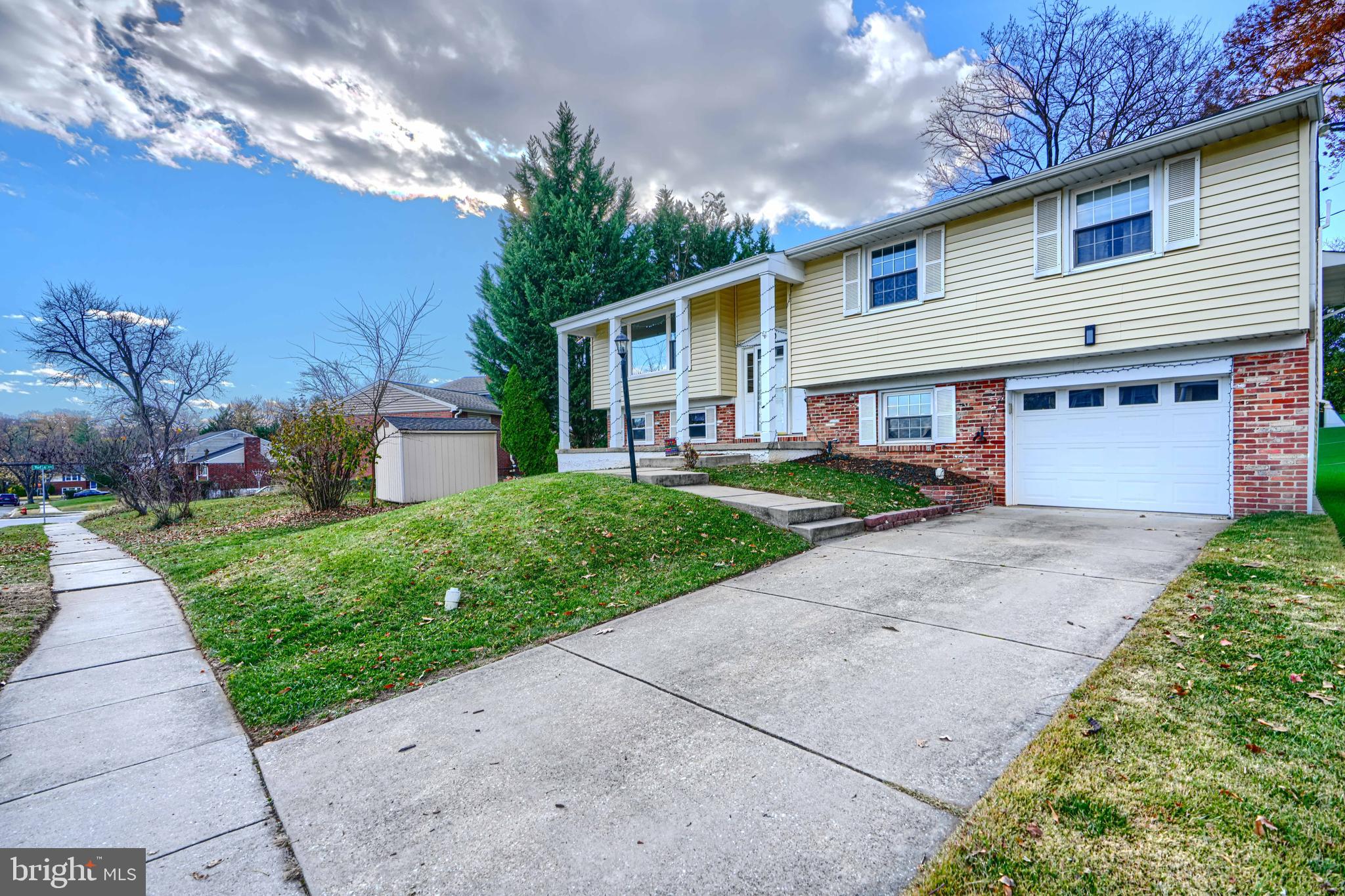 2110 Folkstone Road Lutherville-Timonium, MD 21093 - Photo 47 of 49 a front view of house with yard and green space