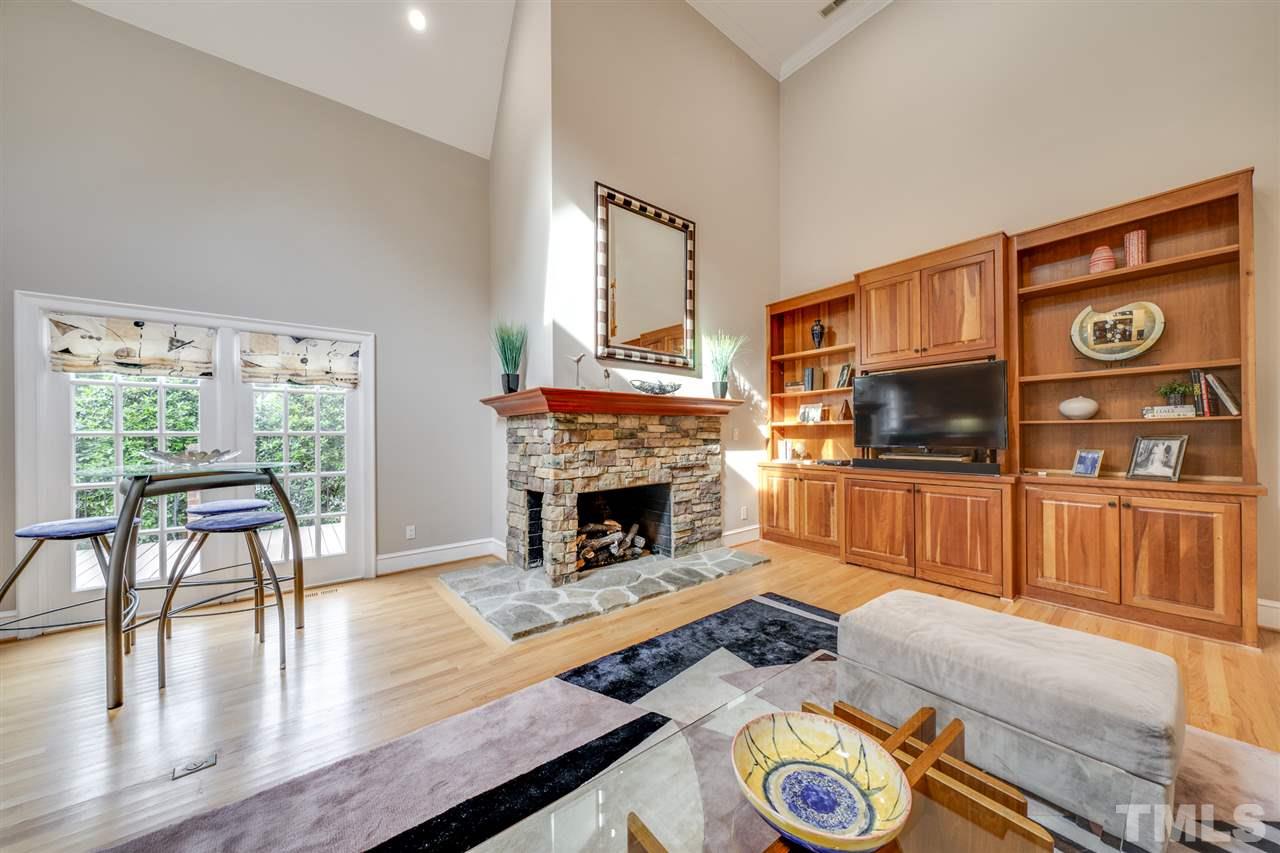 4621 White Chapel Way Raleigh, NC 27615 - Photo 11 of 30 a living room with furniture and a fireplace