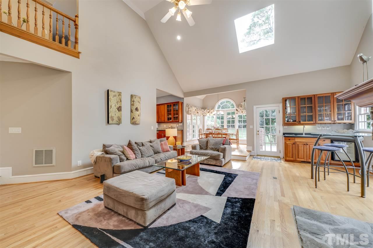 4621 White Chapel Way Raleigh, NC 27615 - Photo 12 of 30 a living room with patio furniture and a large window