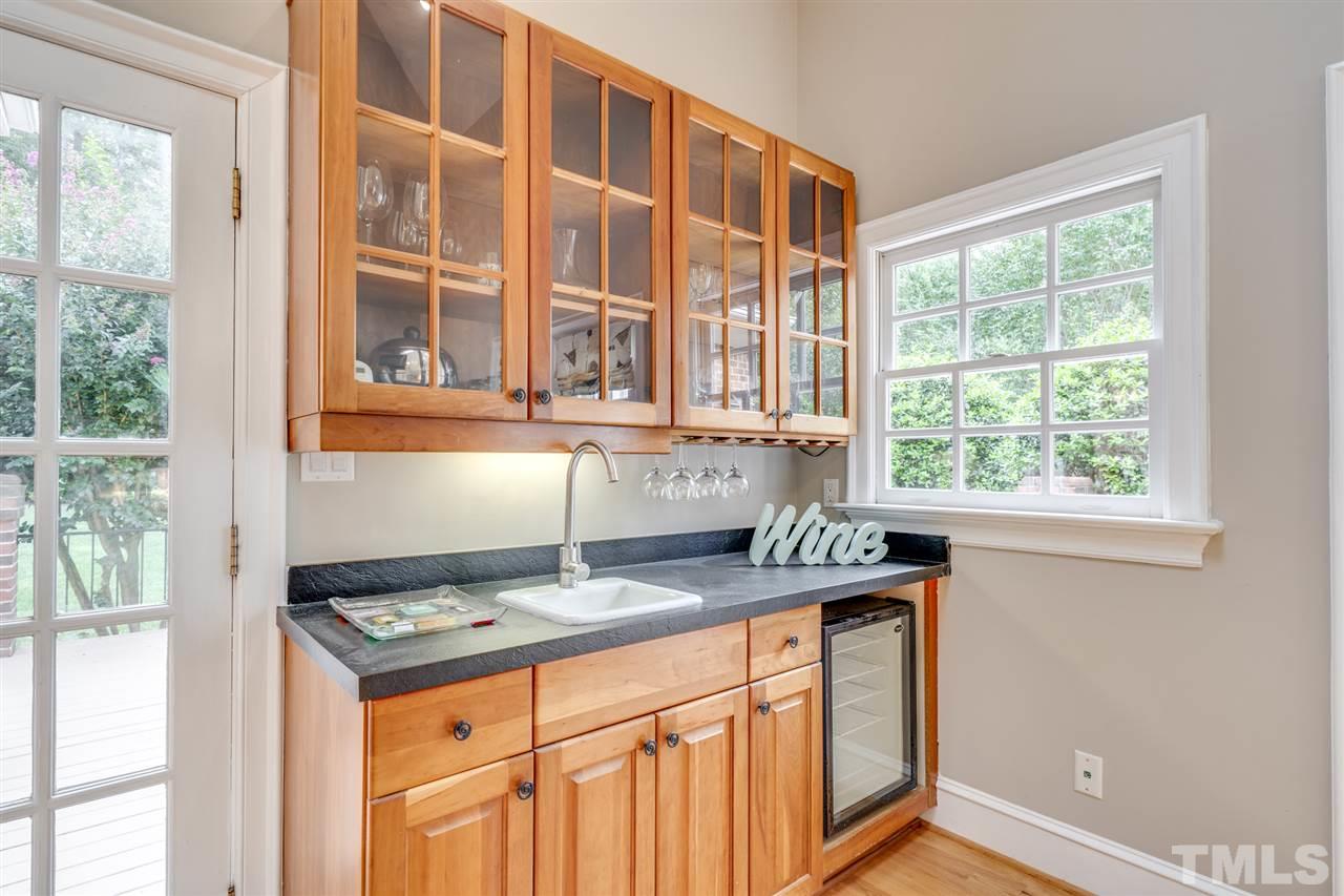 4621 White Chapel Way Raleigh, NC 27615 - Photo 14 of 30 a kitchen that has a stove and a sink