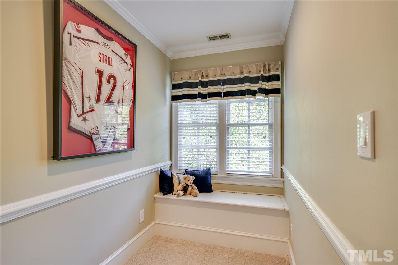 4621 White Chapel Way Raleigh, NC 27615 - Photo 23 of 30 a bathroom with a bathtub and a window