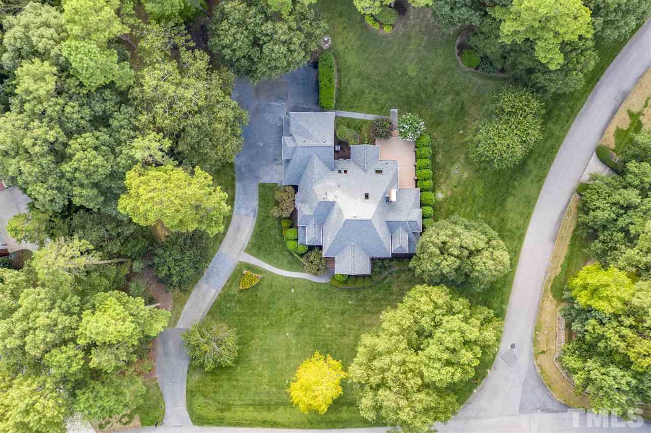 4621 White Chapel Way Raleigh, NC 27615 - Photo 29 of 30 an aerial view of a house with a yard and swimming pool