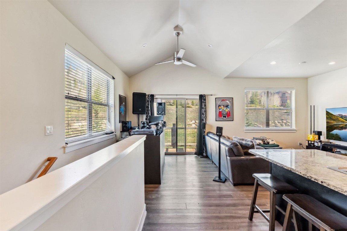 32 Wayback Drive, Unit 32 Keystone, CO 80435 - Photo 11 of 28 a living room with furniture a flat screen tv and a large window