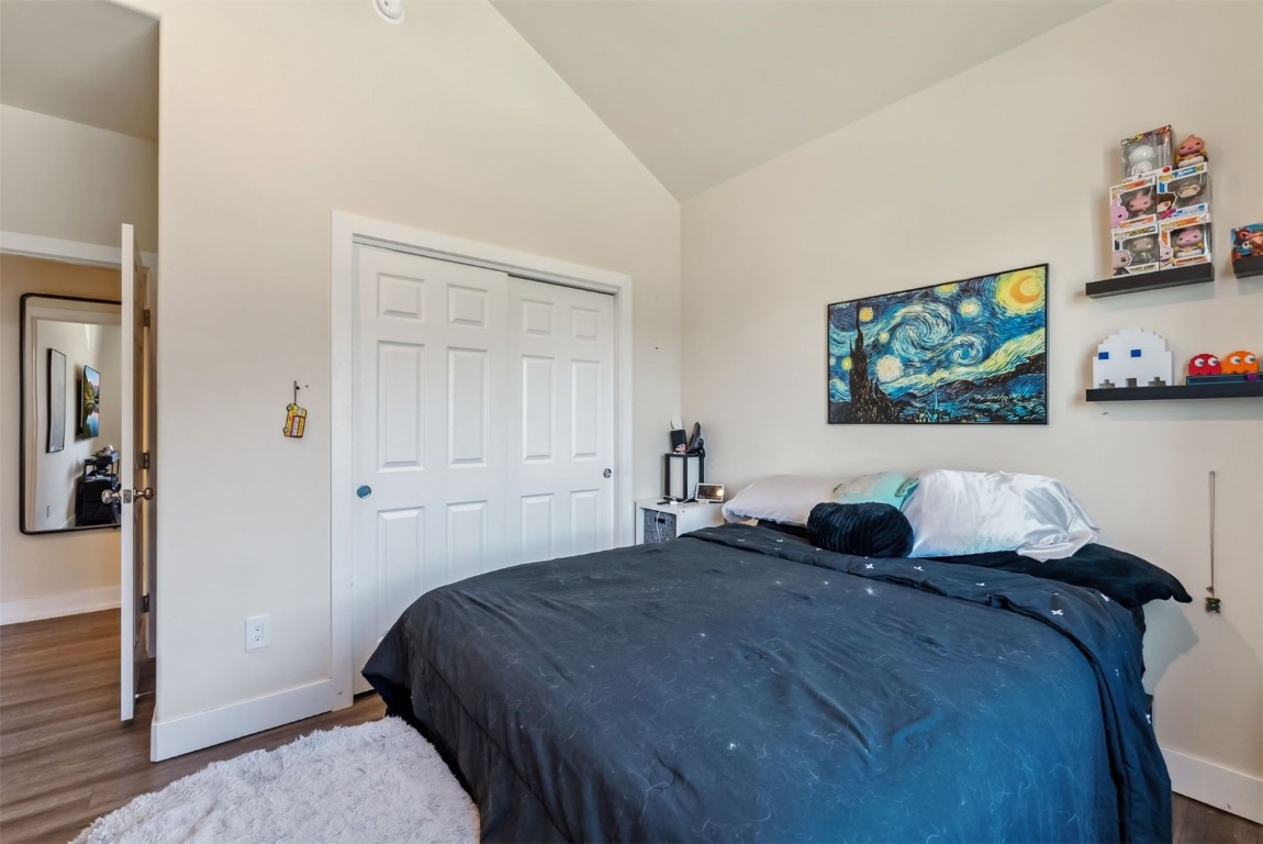 32 Wayback Drive, Unit 32 Keystone, CO 80435 - Photo 17 of 28 a bedroom with a bed and a painting on the wall
