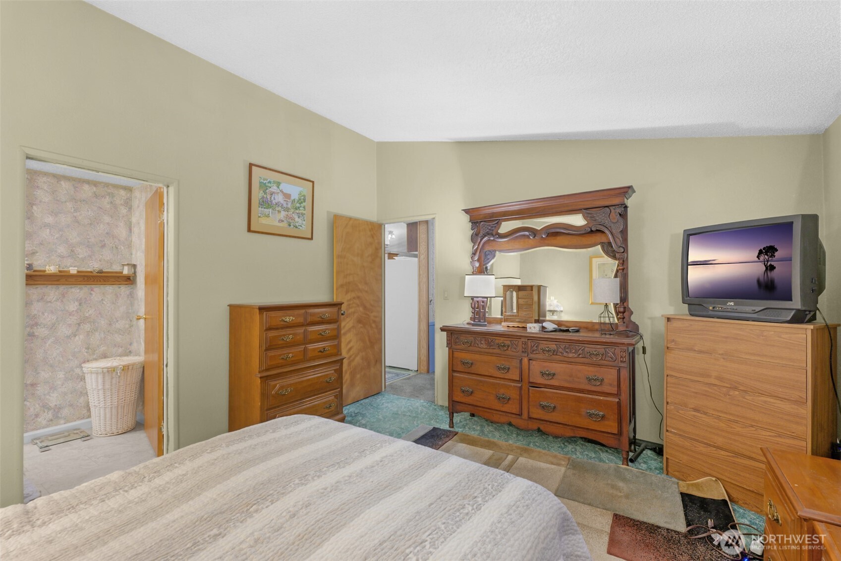 6217 4th Street East Tacoma, WA 98424 - Photo 16 of 40 a bedroom with a bed and dresser