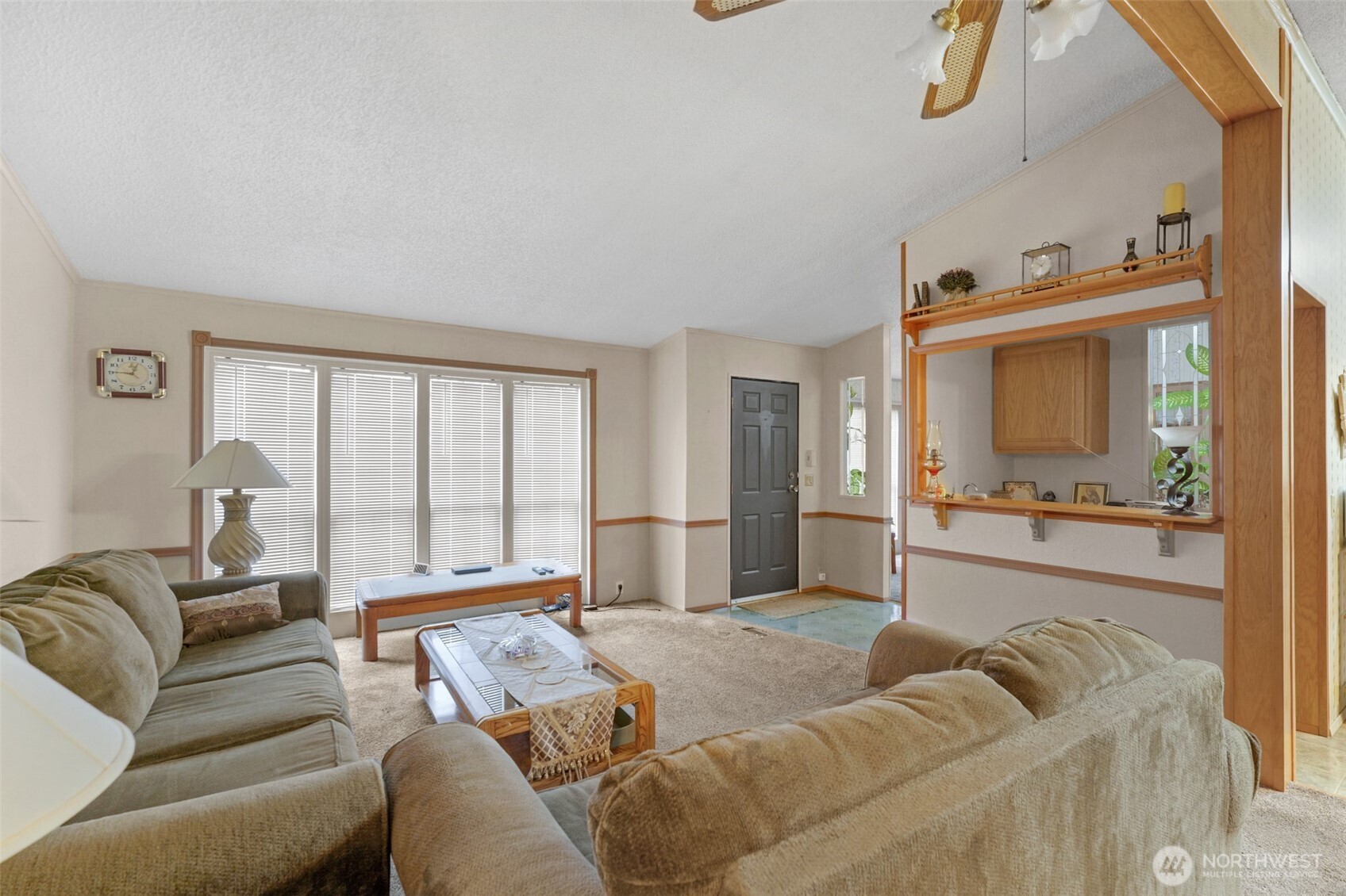 6217 4th Street East Tacoma, WA 98424 - Photo 23 of 40 a living room with furniture and a flat screen tv