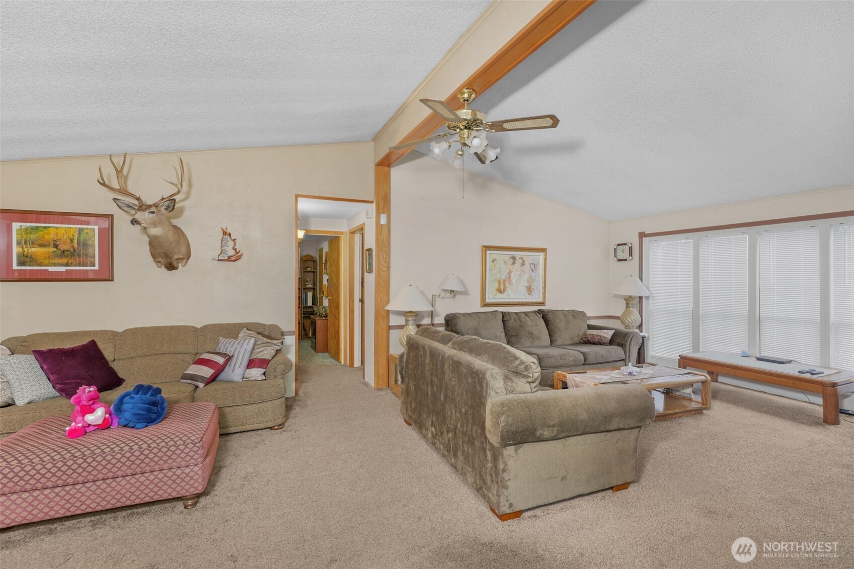 6217 4th Street East Tacoma, WA 98424 - Photo 27 of 40 a living room with furniture and a ceiling fan