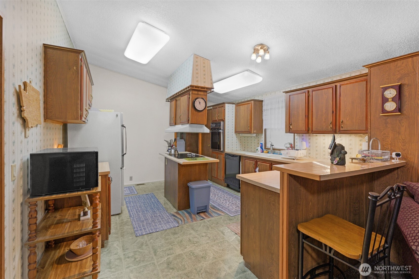 6217 4th Street East Tacoma, WA 98424 - Photo 28 of 40 a kitchen with a sink cabinets and window