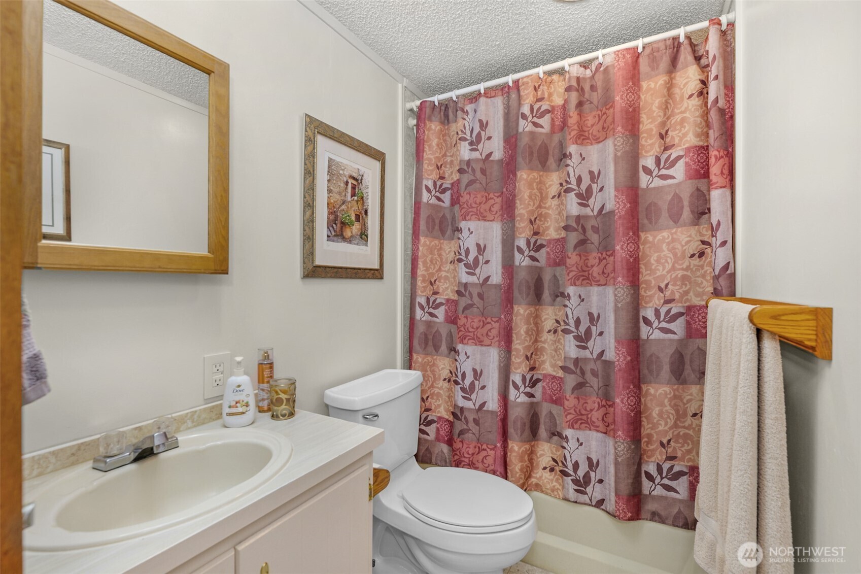 6217 4th Street East Tacoma, WA 98424 - Photo 34 of 40 a bathroom with a sink toilet and shower