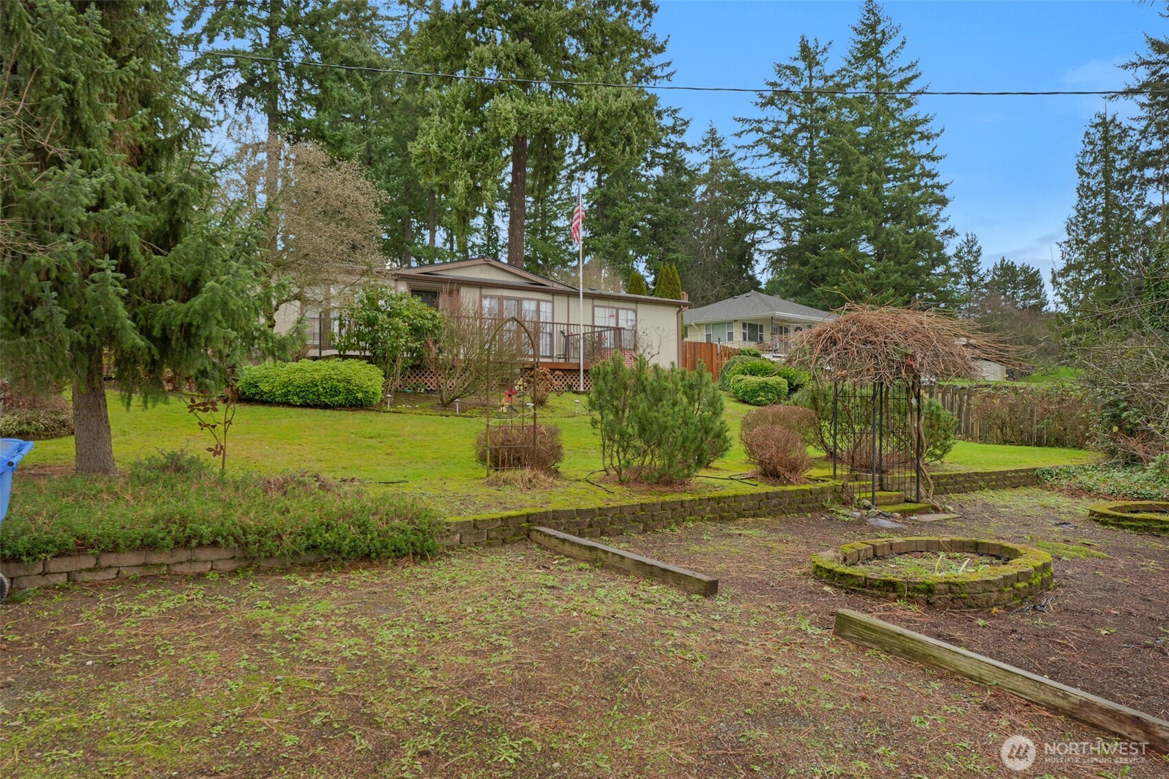6217 4th Street East Tacoma, WA 98424 - Photo 9 of 40 a view of a park with large trees