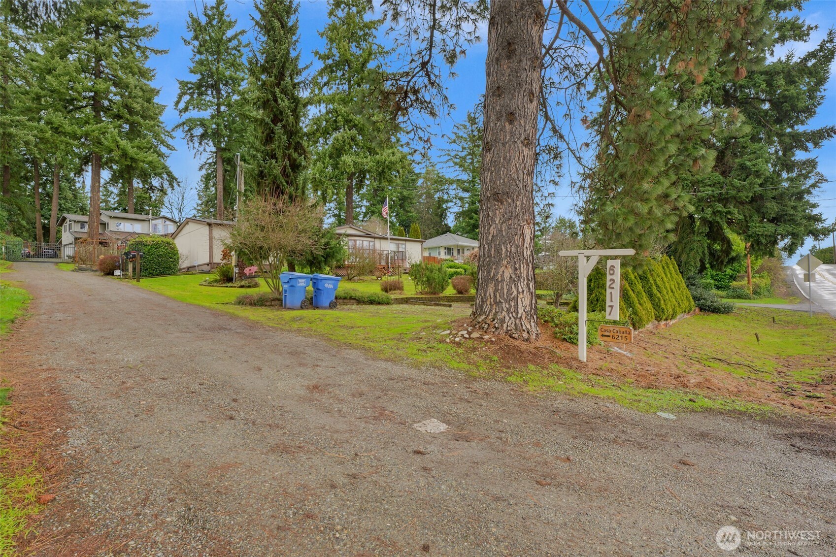 6217 4th Street East Tacoma, WA 98424 - Photo 10 of 40 a view of a park with large trees