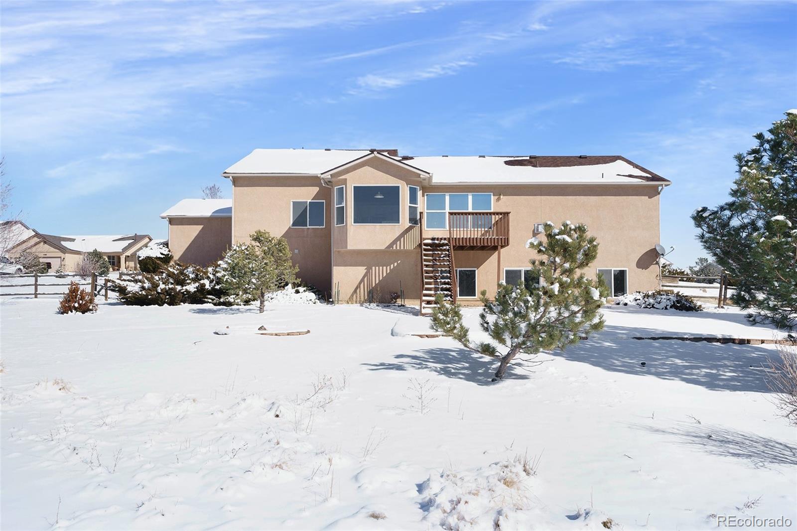 11949 Rio Secco Road Peyton, CO 80831 - Photo 7 of 19 a view of a terrace with a bench