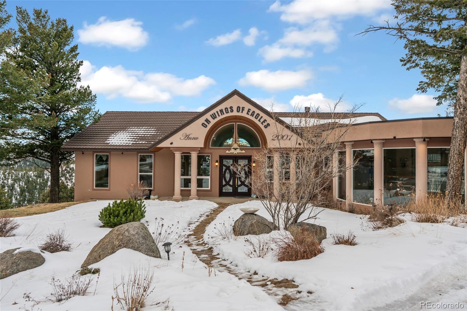 323 Overlook Lane Boulder, CO 80302 - Photo 1 of 40 a view of a house with a yard