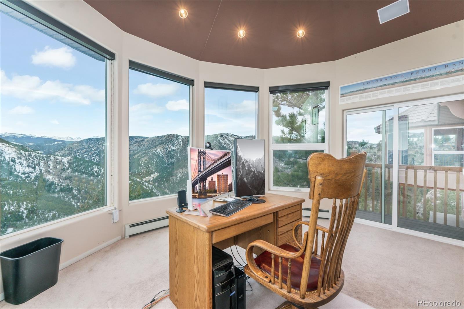 323 Overlook Lane Boulder, CO 80302 - Photo 12 of 40 a view of a dining room with furniture window and outside view