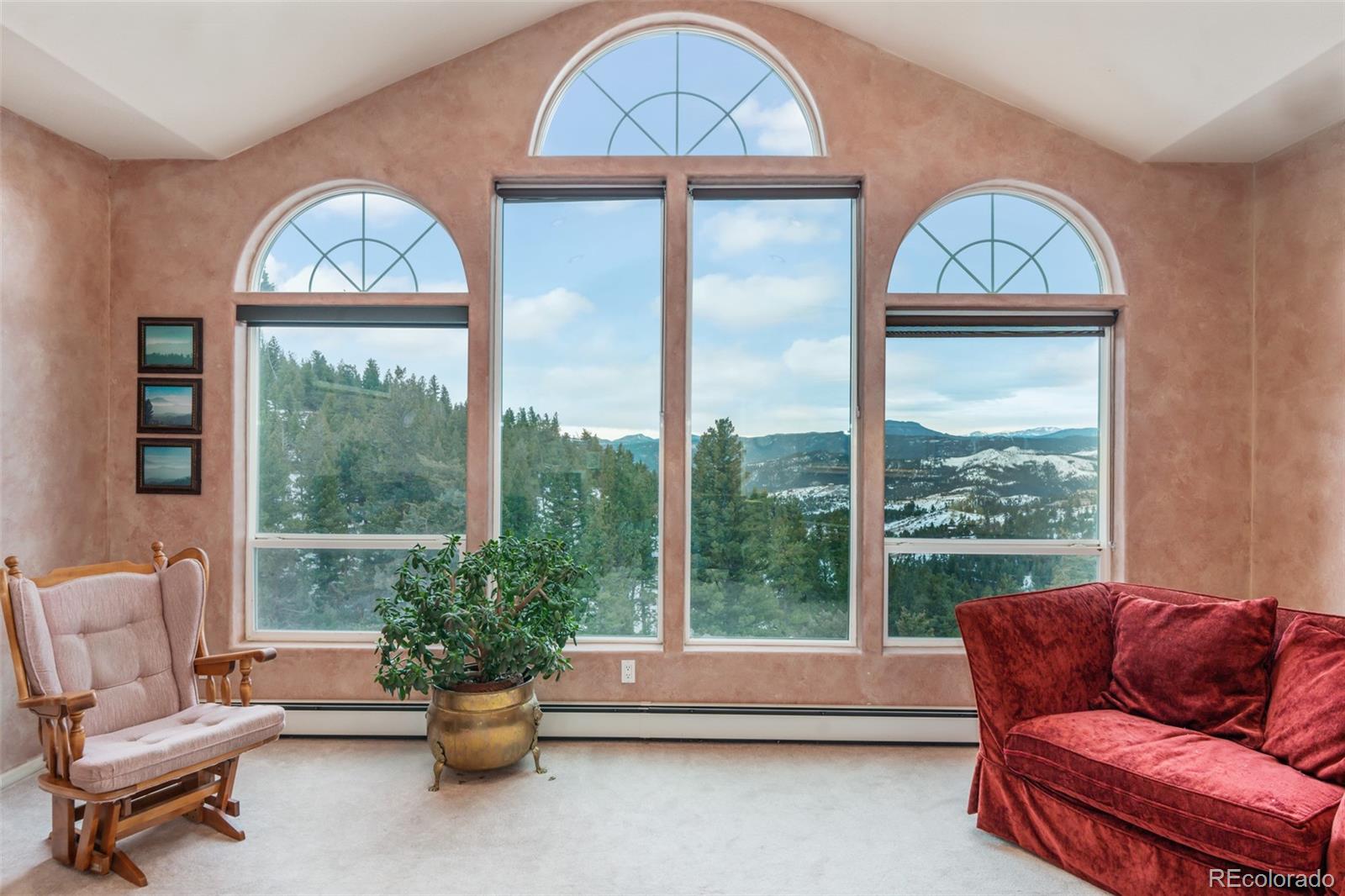 323 Overlook Lane Boulder, CO 80302 - Photo 13 of 40 a living room with furniture and a large window