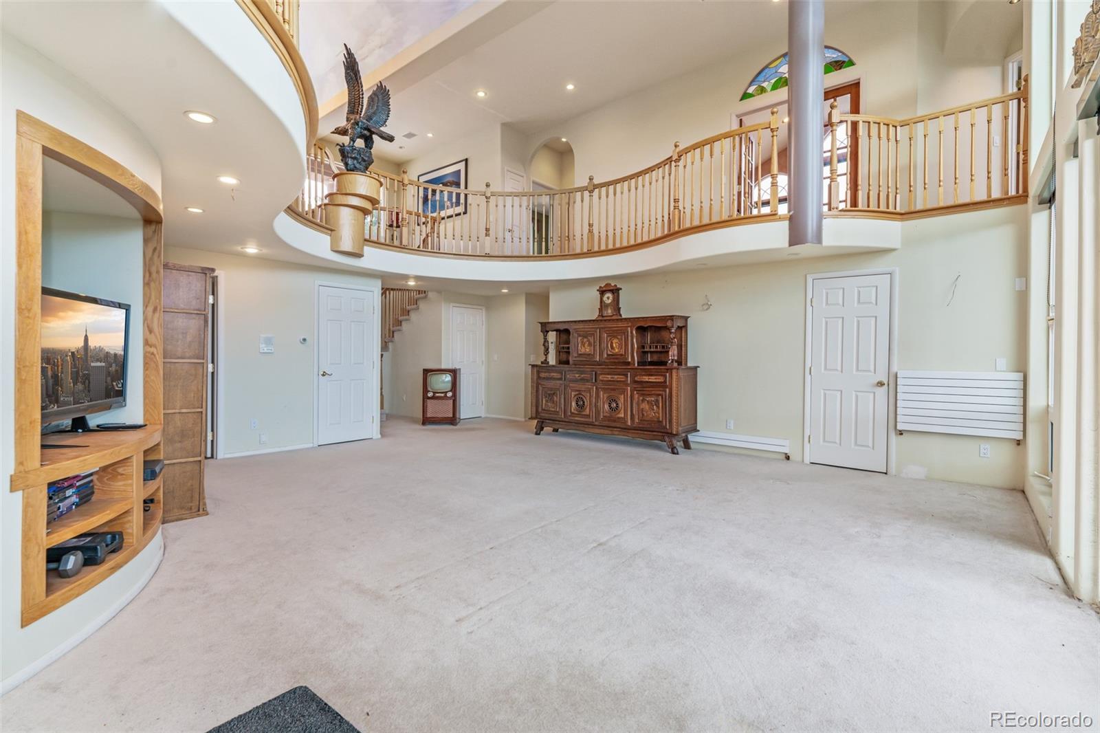 323 Overlook Lane Boulder, CO 80302 - Photo 18 of 40 a view of a hallway with a livingroom and chandelier