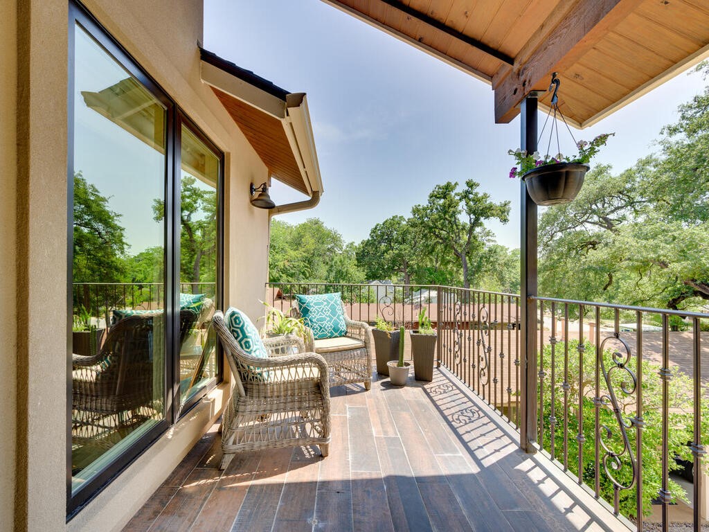 3907 Bailey Lane Austin, TX 78756 - Photo 26 of 37 Through the sliding glass door, the balcony extends the game room space on warm summer days.