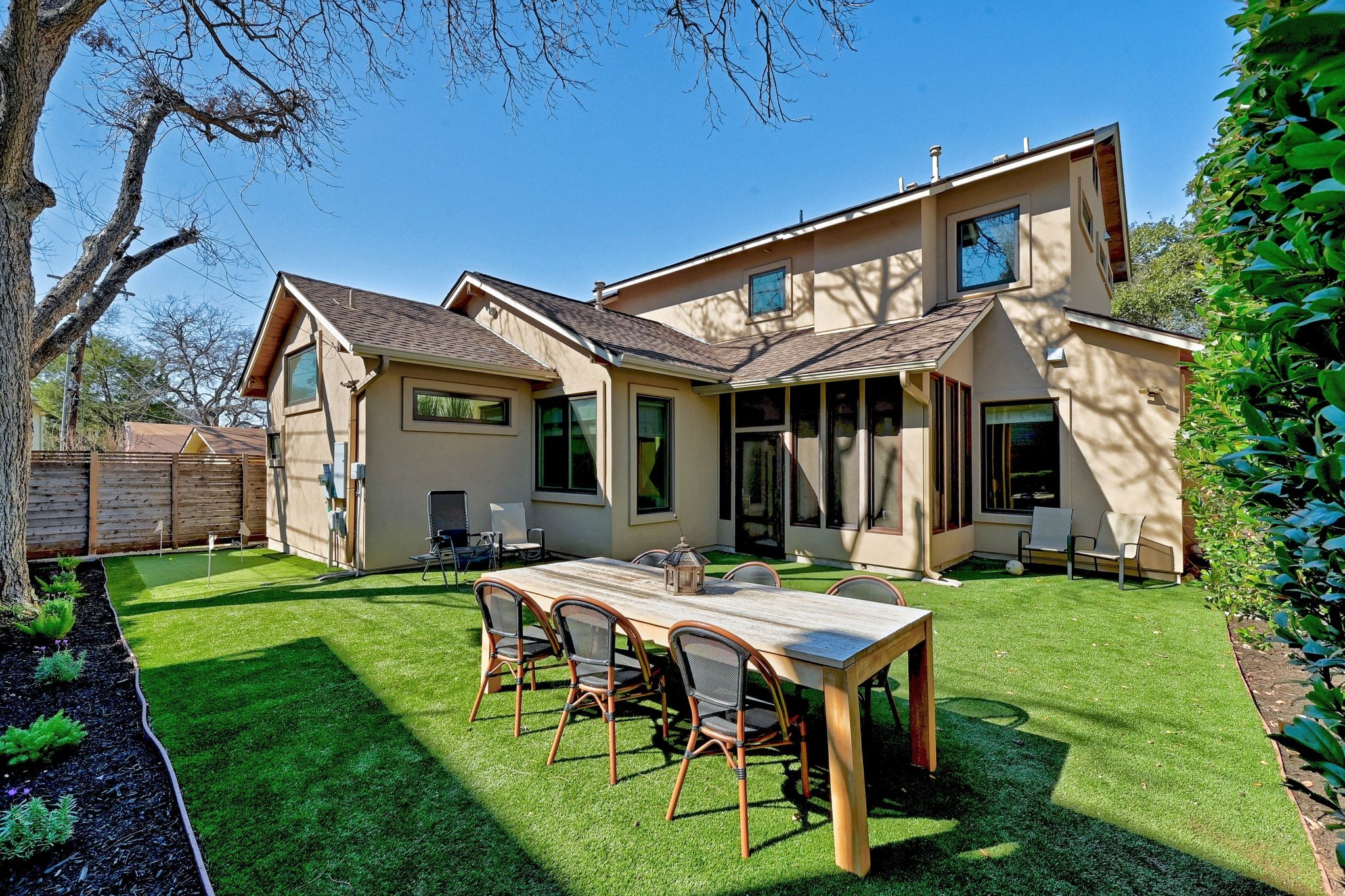 3907 Bailey Lane Austin, TX 78756 - Photo 31 of 37 Additional features of this incredible home include solid wood doors, Carrier A/C units, extensive security fencing, circulating tankless water heater, and an upgraded 50 year roof