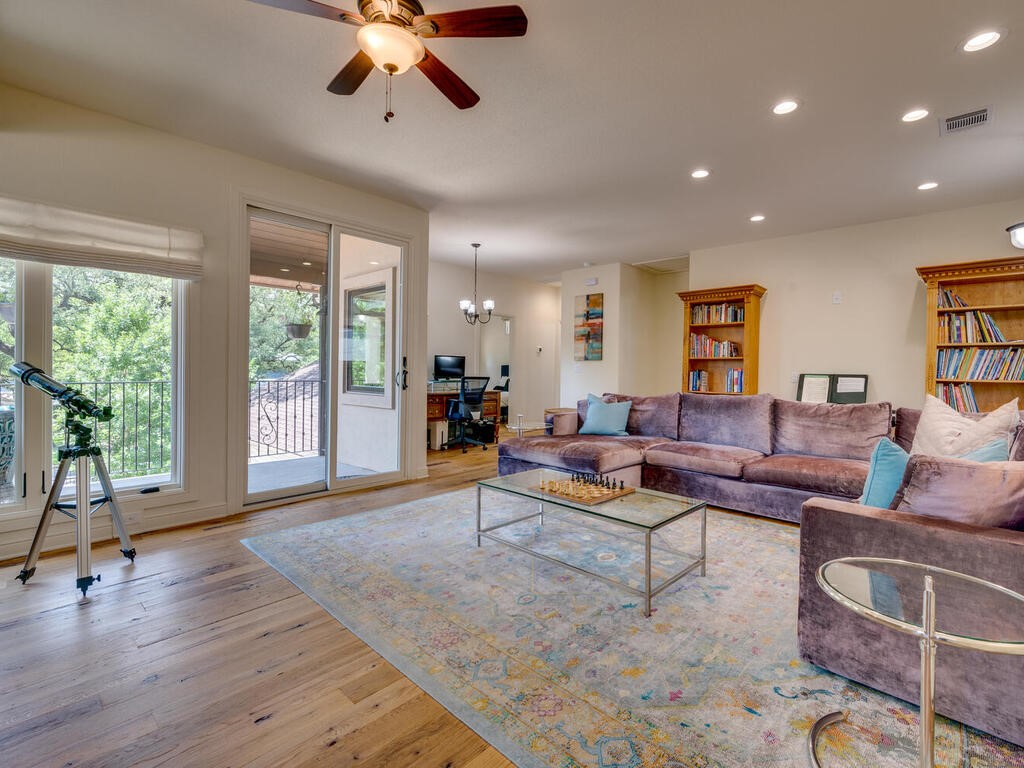 3907 Bailey Lane Austin, TX 78756 - Photo 6 of 37 The upstairs game room is impressive with an incredible amount of space for game tables, lounge furniture, toys, and so much more