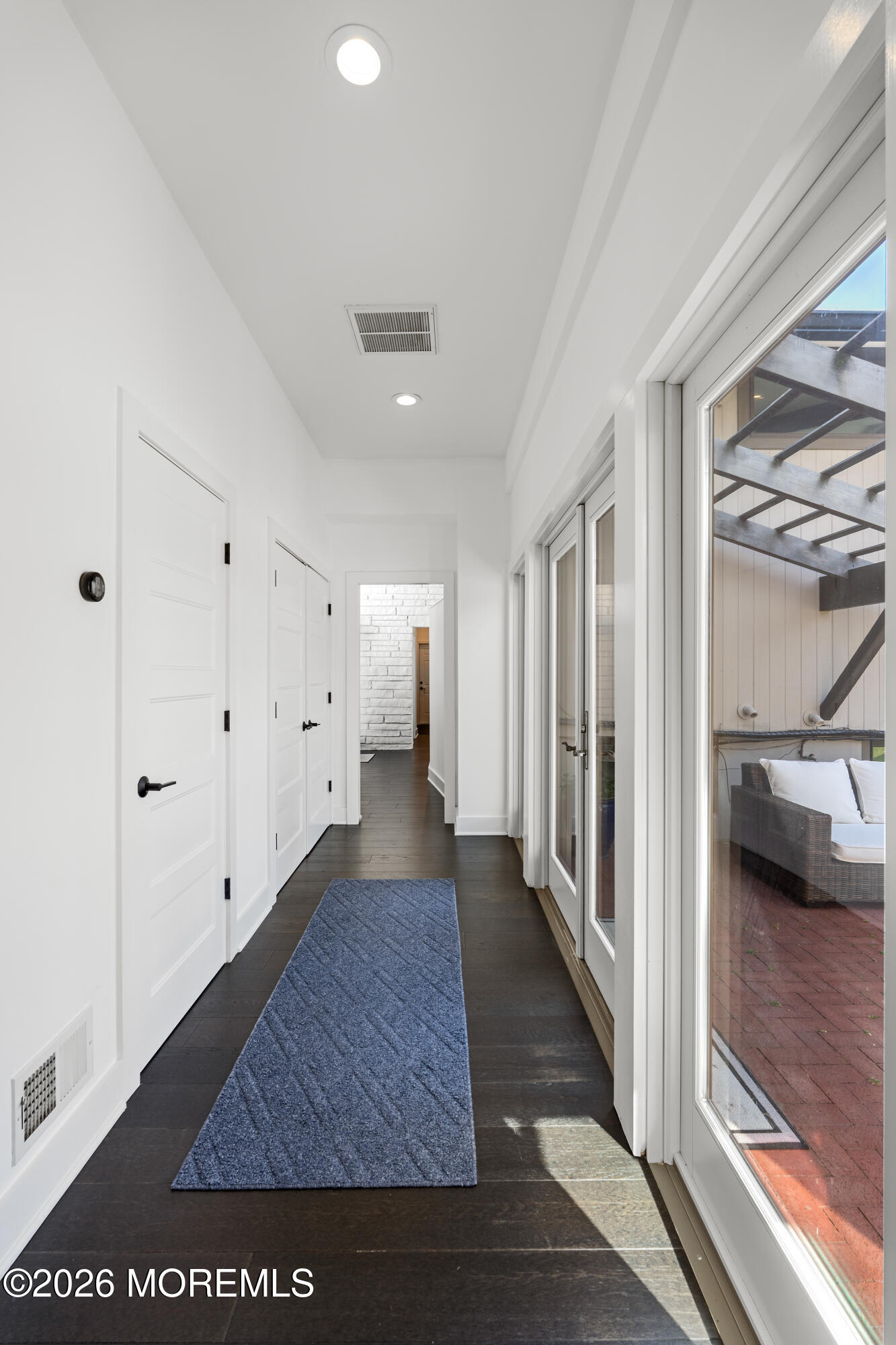 710 Fernmere Avenue Interlaken, NJ 07712 - Photo 17 of 37 a view of a hallway with wooden floor and closet