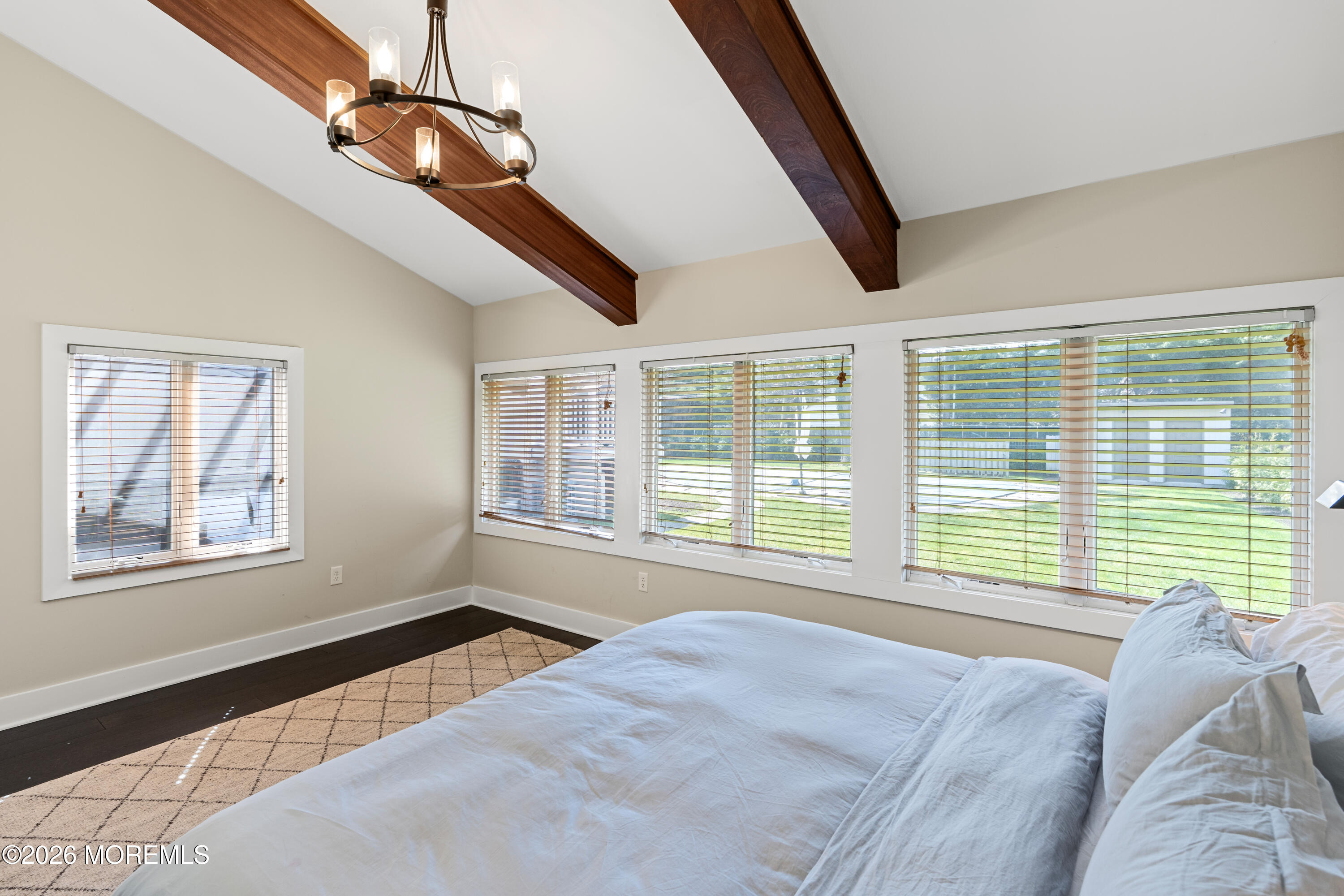 710 Fernmere Avenue Interlaken, NJ 07712 - Photo 20 of 37 a bed room with a bed and a large window