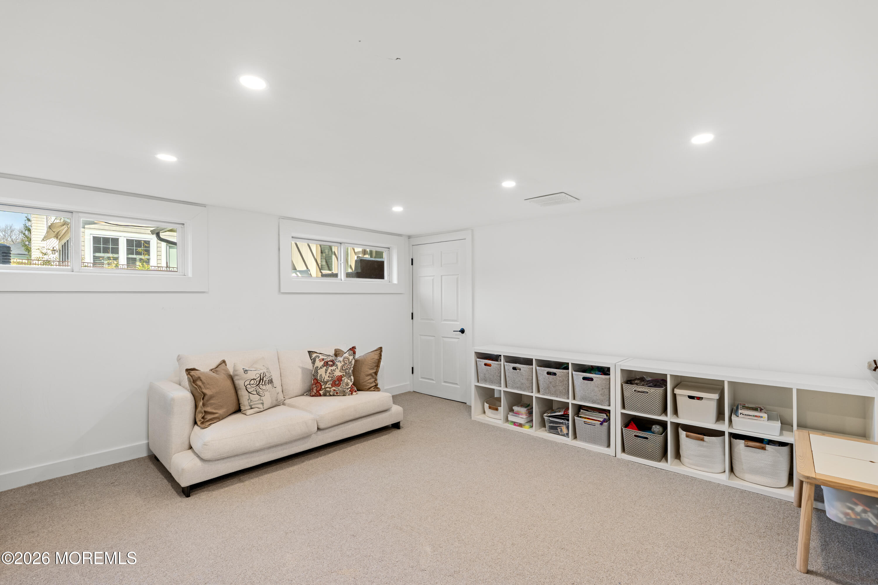 710 Fernmere Avenue Interlaken, NJ 07712 - Photo 30 of 37 a living room with furniture and hard wood flooring