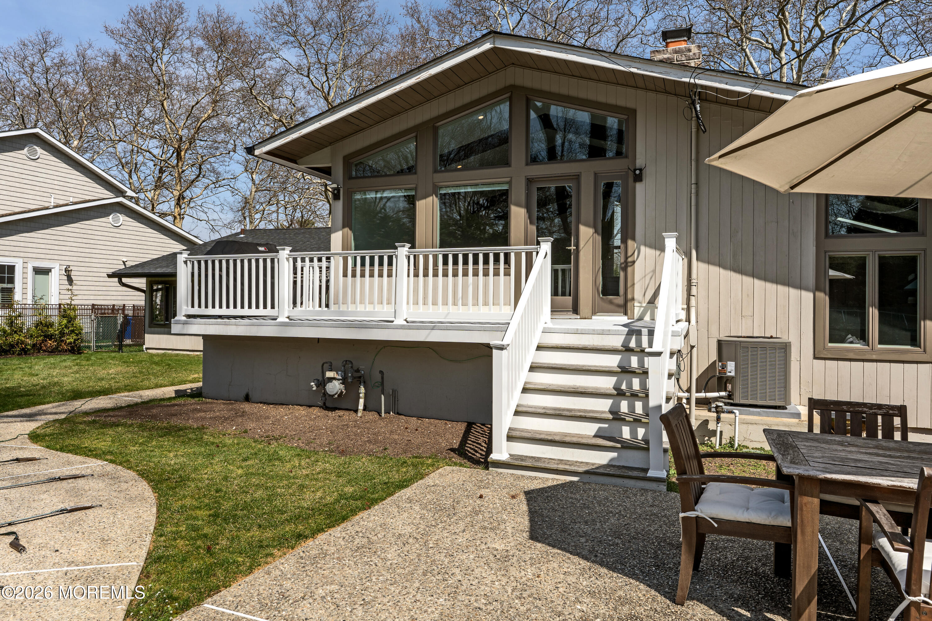 710 Fernmere Avenue Interlaken, NJ 07712 - Photo 33 of 37 a front view of a house with a porch