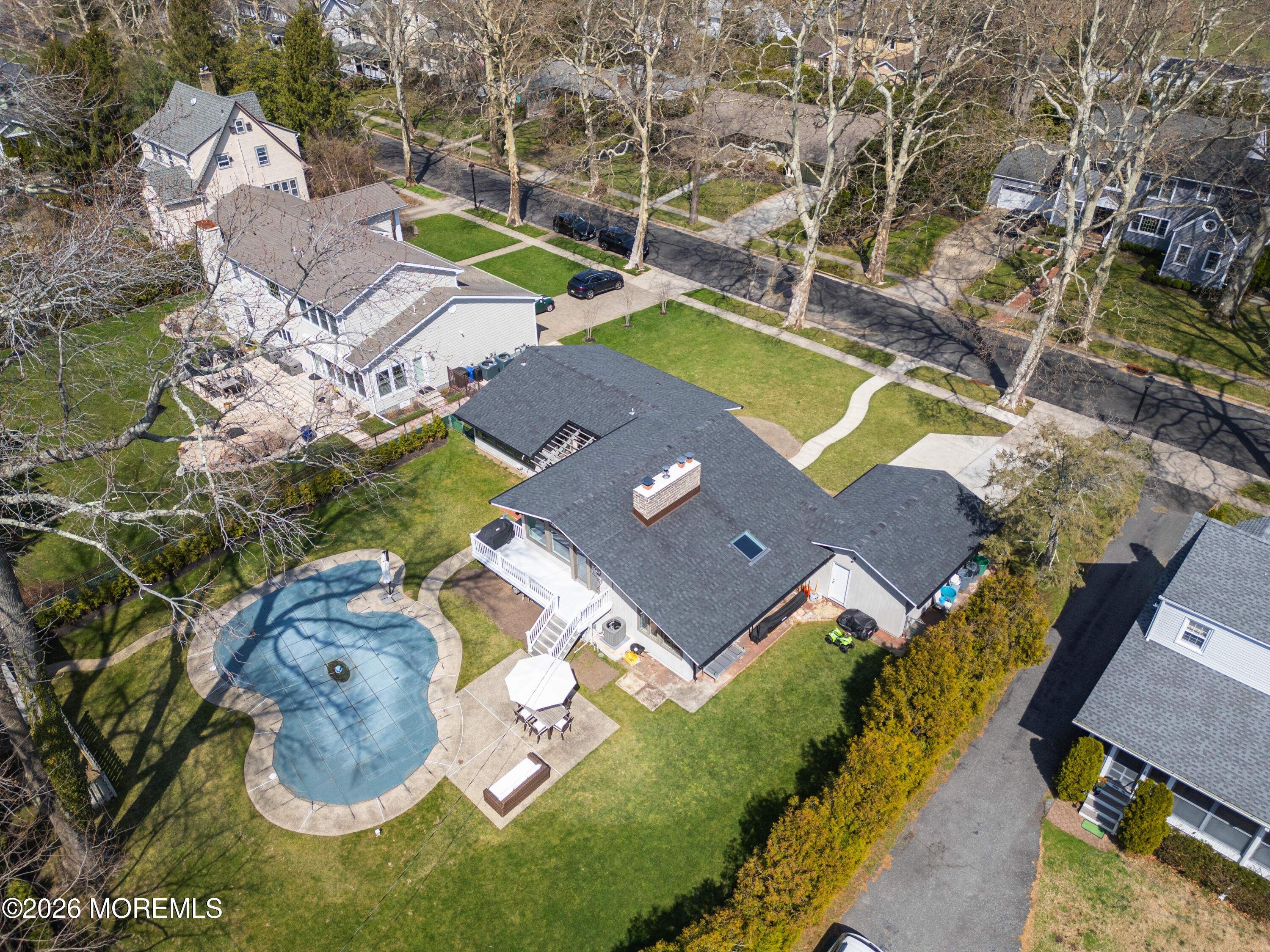 710 Fernmere Avenue Interlaken, NJ 07712 - Photo 37 of 37 an aerial view of a house with a swimming pool