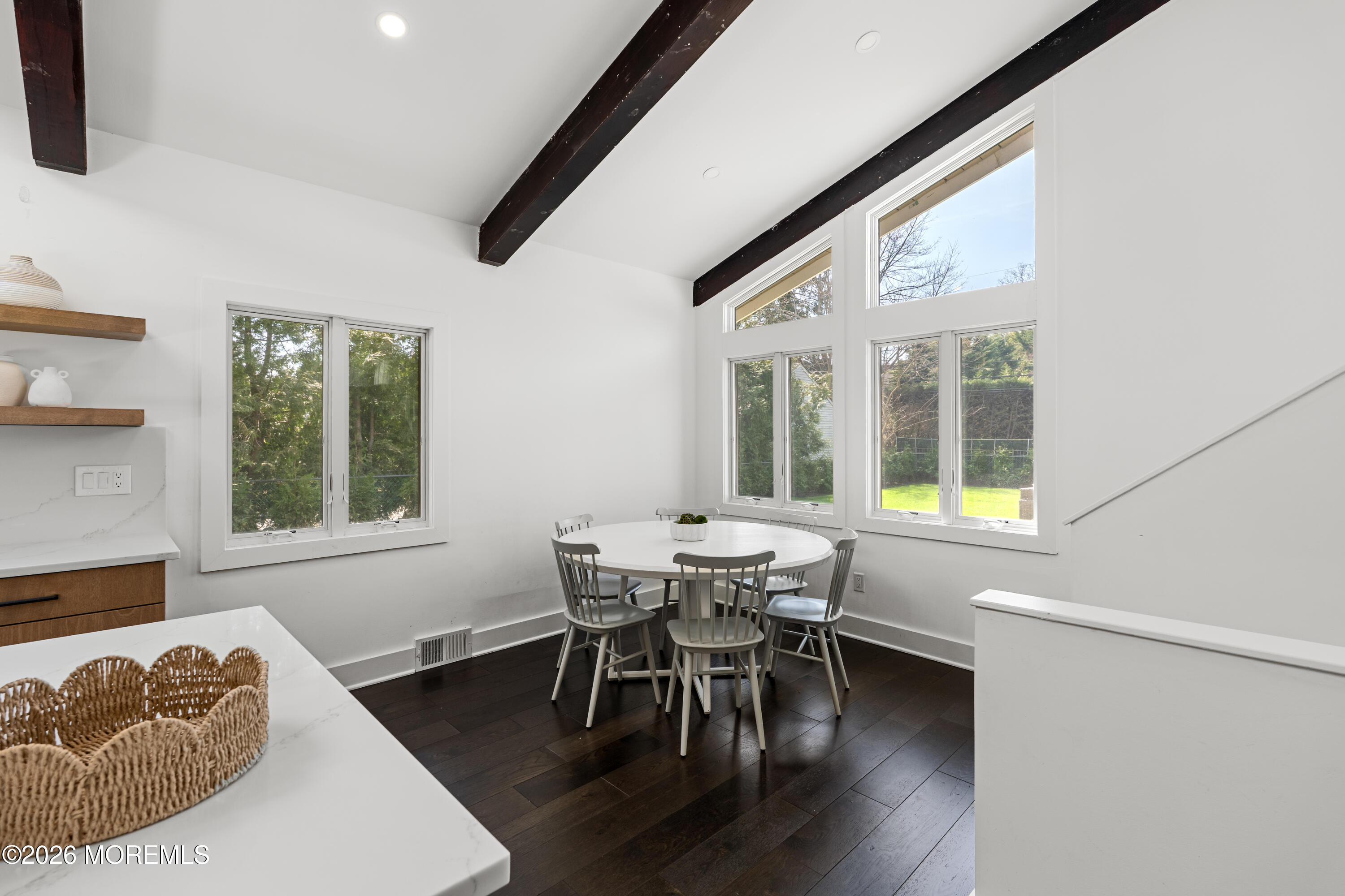 710 Fernmere Avenue Interlaken, NJ 07712 - Photo 9 of 37 a dining room with furniture and wooden floor