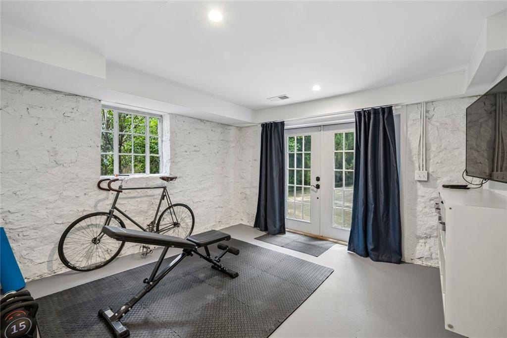 2069 Edinburgh Terrace Northeast Atlanta, GA 30307 - Photo 43 of 72 a view of a room with gym equipment