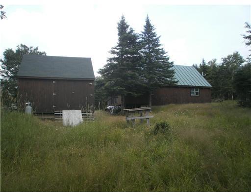 141 No Road West West Forks, ME 04985 - Photo 9 of 22 Exterior Back.
