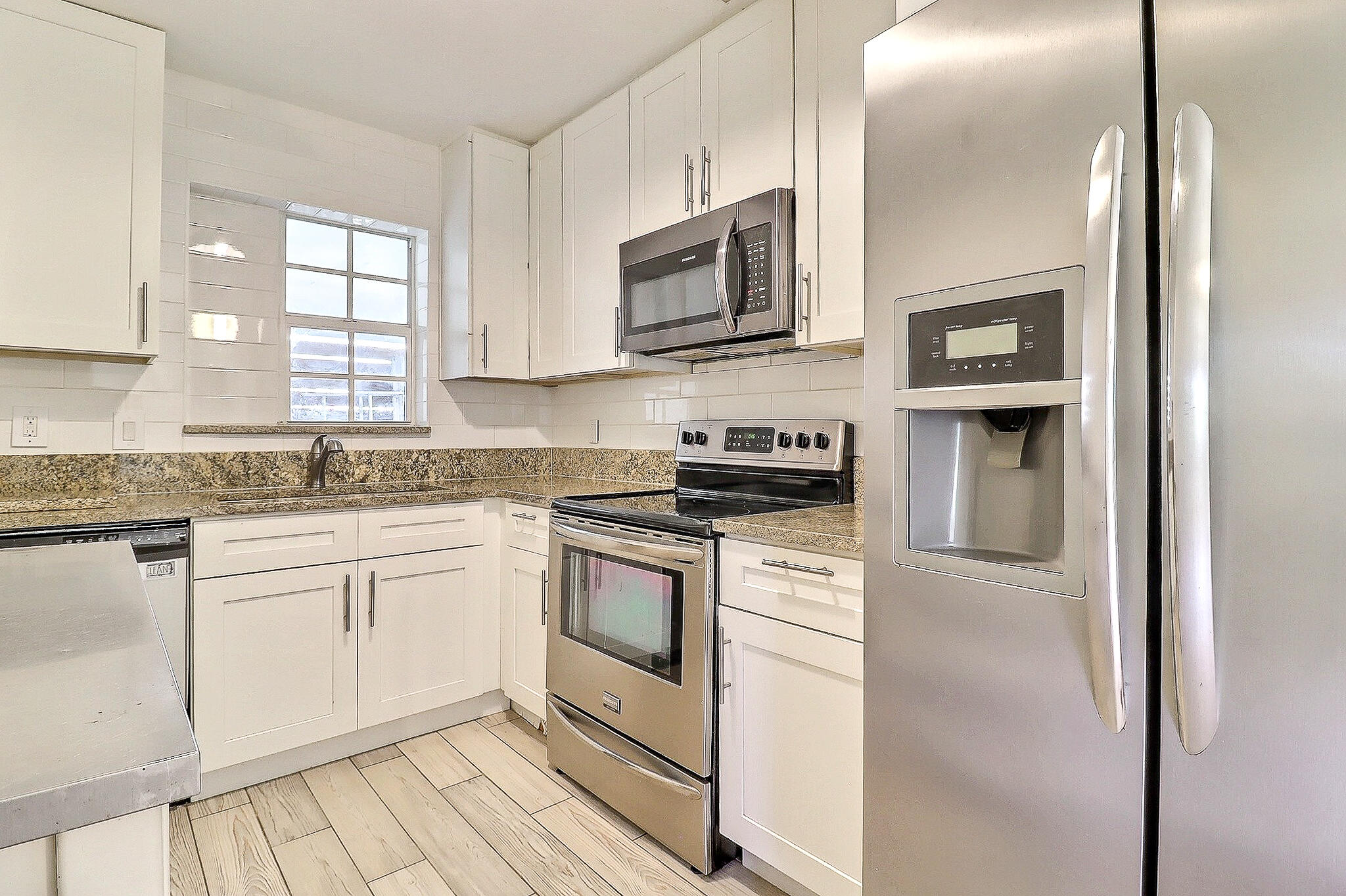 337 Mid Pines Road Palm Springs, FL 33461 - Photo 3 of 32 8c246a09fd77c61c2237ae0a27b9150f7c47ee25