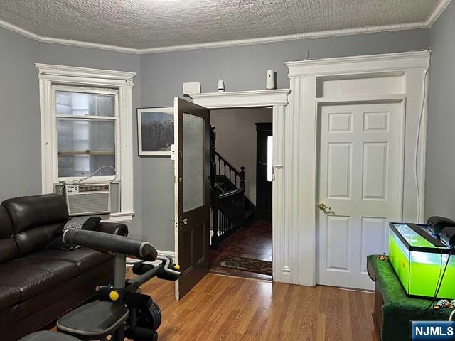 304 Harrison Avenue, Unit 1) Harrison, NJ 07029 - Photo 12 of 15 a view of room with furniture and wooden floor