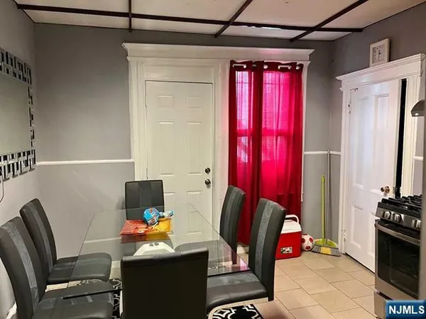a kitchen with stainless steel appliances granite countertop a stove and a refrigerator