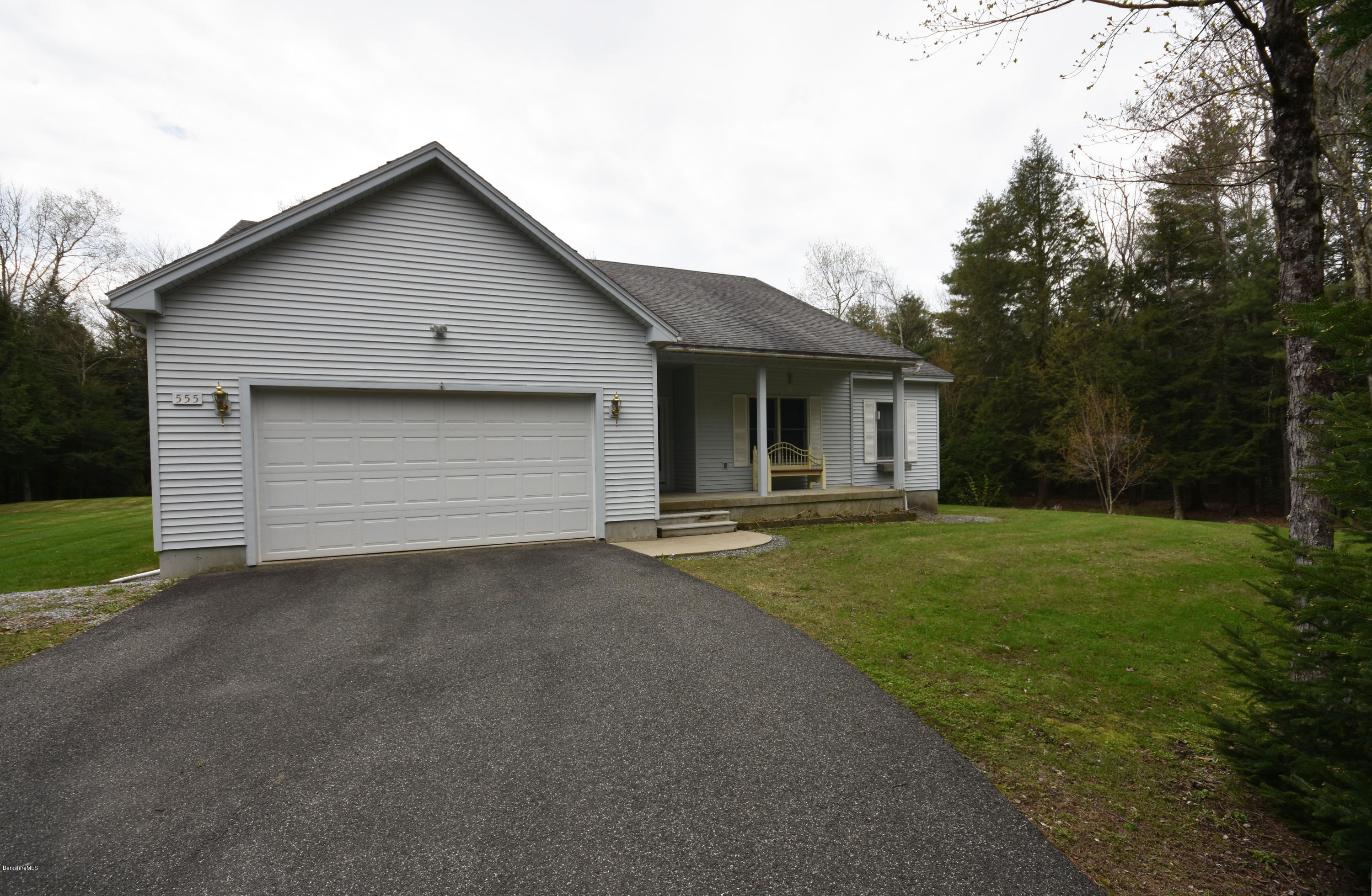 555 West Center Road Otis, MA 01253 - Photo 3 of 49 a view of an house with backyard space and garden
