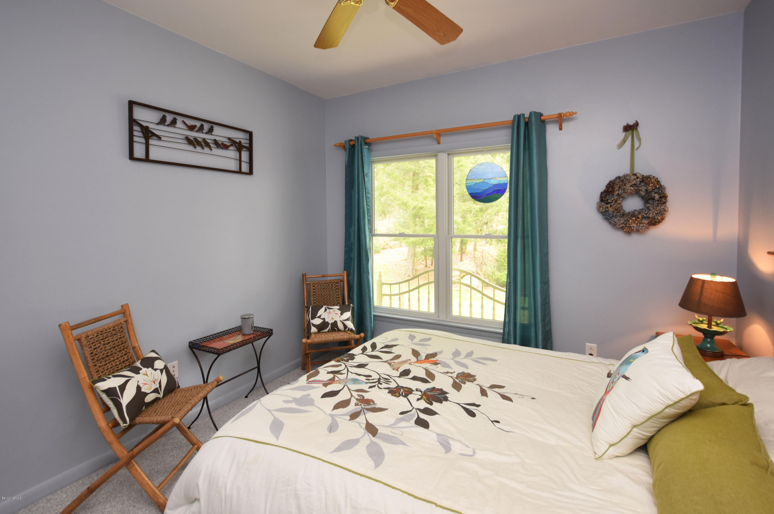 555 West Center Road Otis, MA 01253 - Photo 29 of 49 a bedroom with a bed and a window