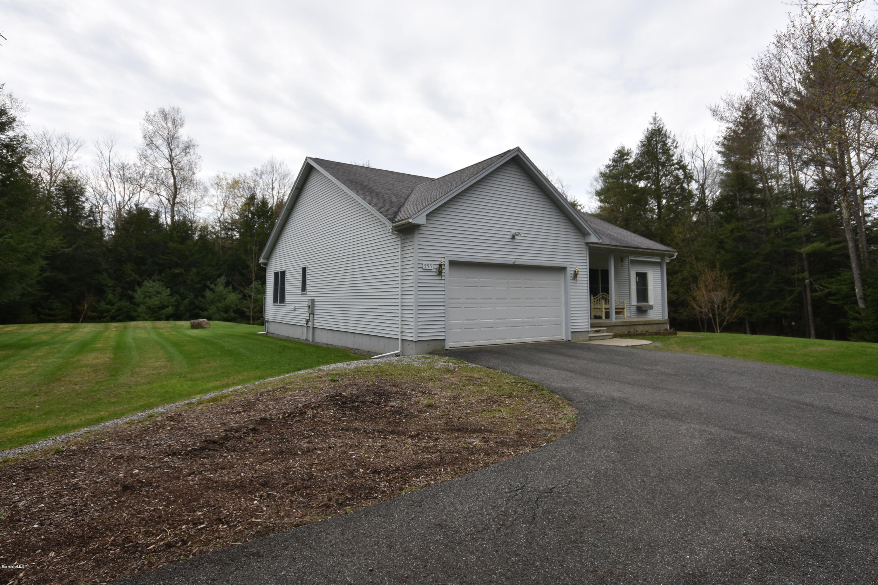 555 West Center Road Otis, MA 01253 - Photo 4 of 49 a view of a house with backyard and garden