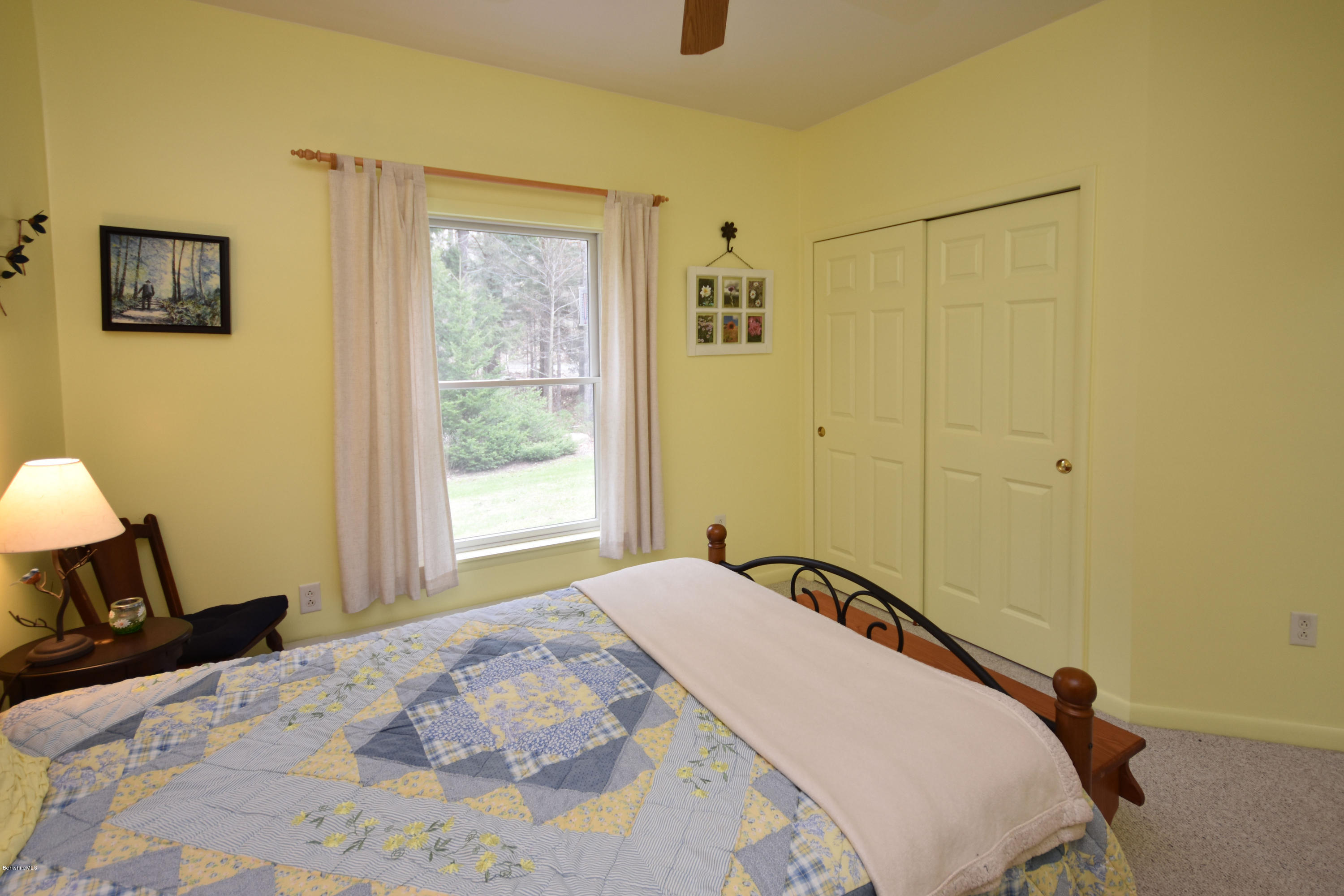 555 West Center Road Otis, MA 01253 - Photo 33 of 49 a bedroom with a bed and a window