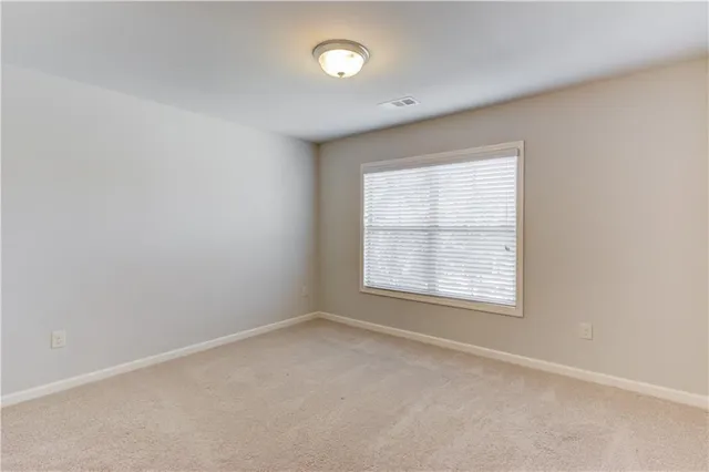 an empty room with a window