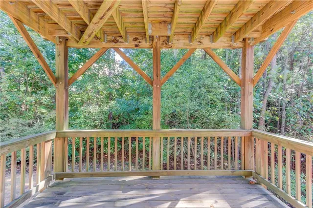 a view of porch with a small deck