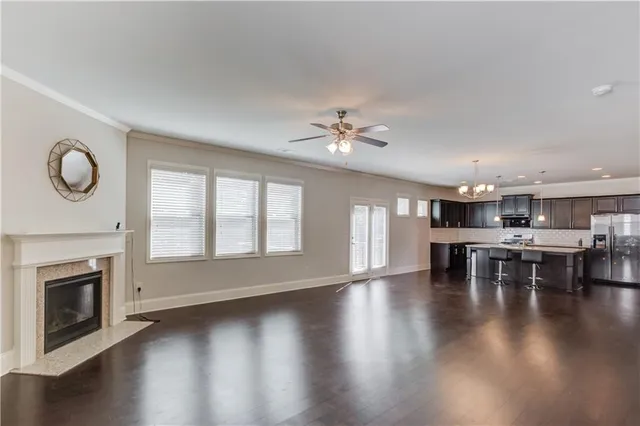 a view of dining room with furniture and wooden floor