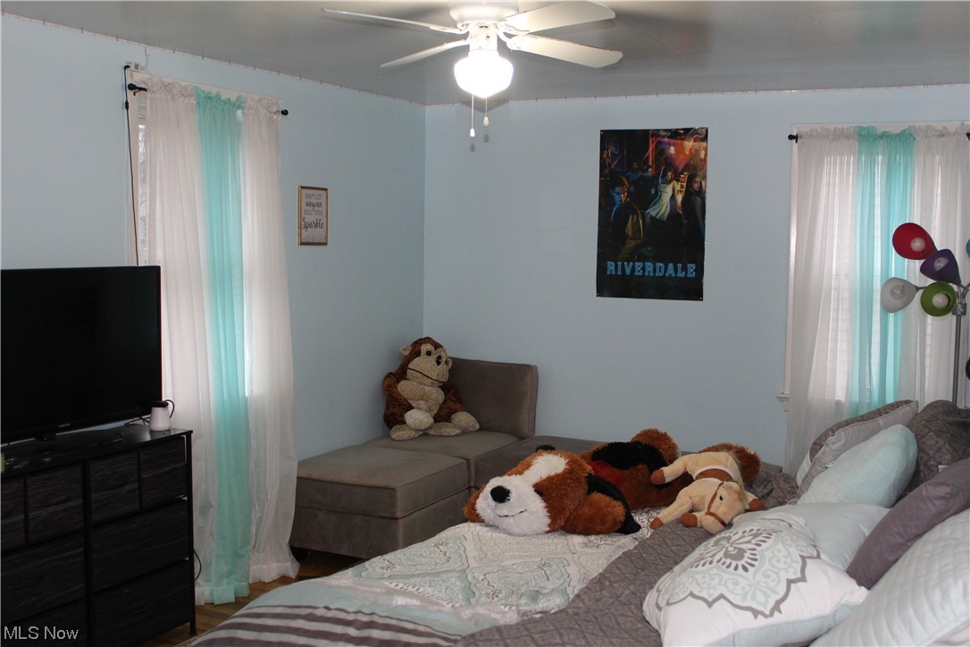 1292 Ford Road Lyndhurst, OH 44124 - Photo 16 of 25 Bedroom featuring multiple windows and ceiling fan