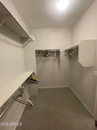 a view of a room with racks on the wall