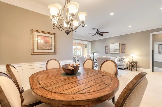 a kitchen with stainless steel appliances granite countertop a stove a sink a oven and a refrigerator