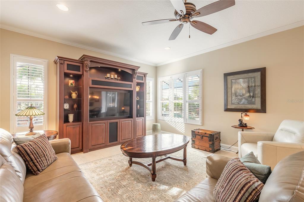 10915 Ledgement Lane Windermere, FL 34786 - Photo 22 of 60 a living room with furniture and a window