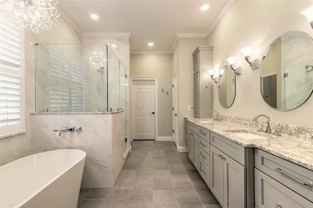 a bed room with a bed and a ceiling fan