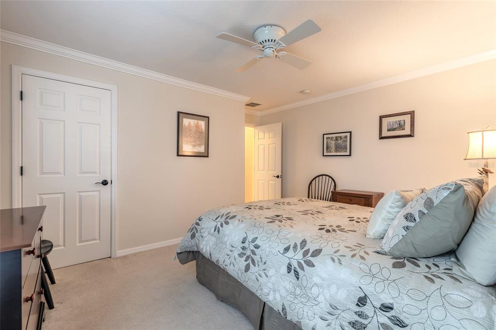 10915 Ledgement Lane Windermere, FL 34786 - Photo 37 of 60 a bed room with a bed and a dresser