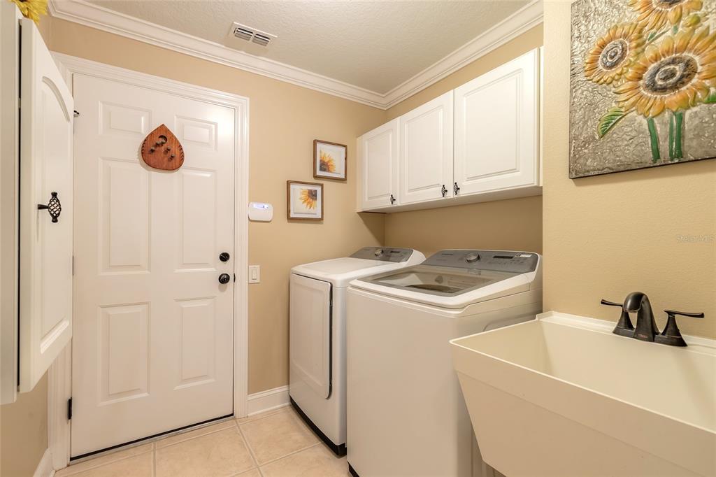 10915 Ledgement Lane Windermere, FL 34786 - Photo 40 of 60 a utility room with dryer and washer