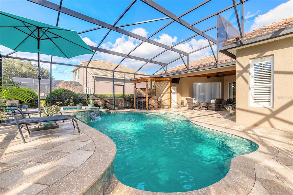 10915 Ledgement Lane Windermere, FL 34786 - Photo 46 of 60 a view of a backyard with sitting area